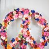 Big Peace Sign with artificial flowers