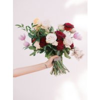 unstructured bouquet with Hints of red velvet roses