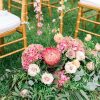 Aisle Arrangment with Protea, Hydrangeas and roses
