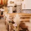 Pew ends with pampas and rose